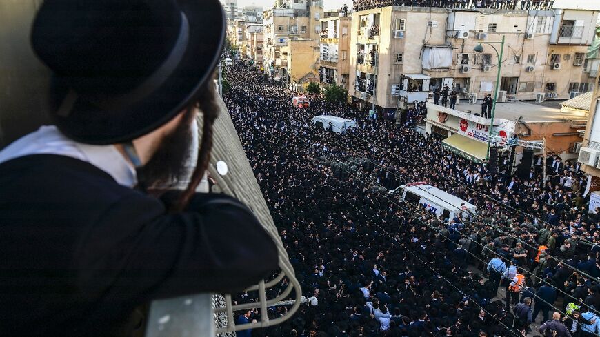 Israeli ultra-Orthodox men  attend the funeral of Rabbi Shimon Baadani, in Bnei Brak near Tel Aviv