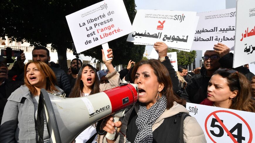 Tunisian journalists protest in the capital Tunis on February 16, 2023, in defence of freedom of expression