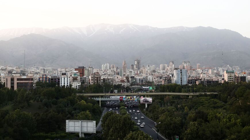 A picture taken on May 18, 2017 shows the skyline of northern Tehran from the "Nature" bridge in the capital Tehran on the eve of the presidential elections. / AFP PHOTO / Behrouz MEHRI (Photo credit should read BEHROUZ MEHRI/AFP via Getty Images)