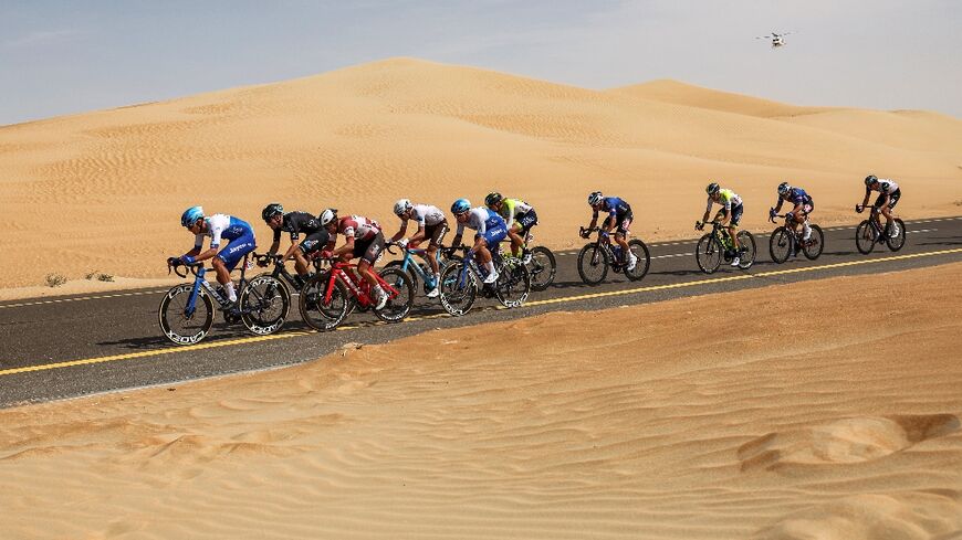 The peloton rides during the first stage of the UAE Tour
