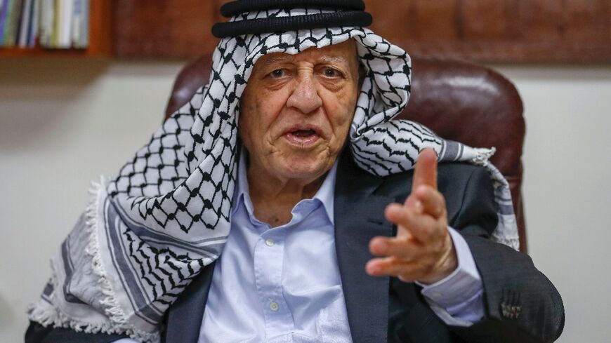 Ahmed Qorei, the lead Palestinian negotiator of the Oslo accords who has died at the age of 85, is seen here in his West Bank office in November 2020