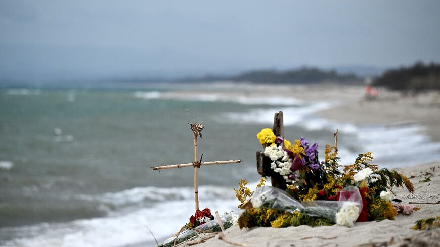 At least 72 people, including many children, perished when their overcrowded boat sank in stormy weather 