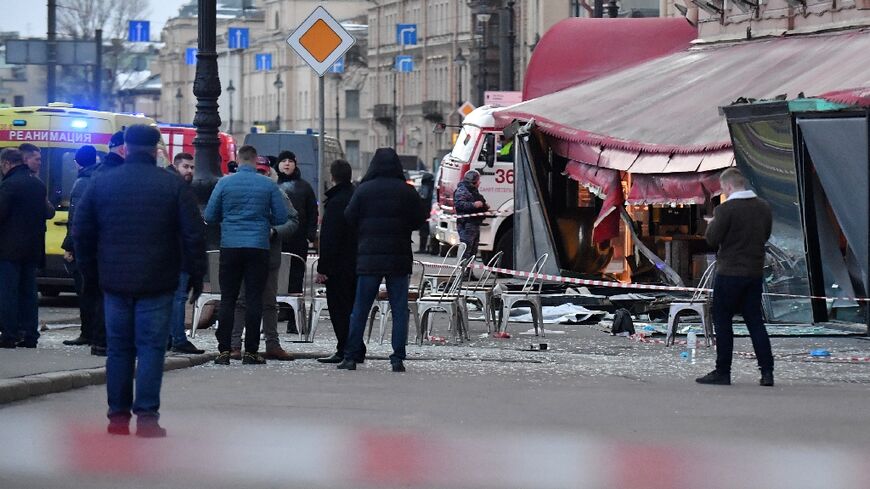 A blast wounded dozens and killed a top military blogger in Saint Petersburg