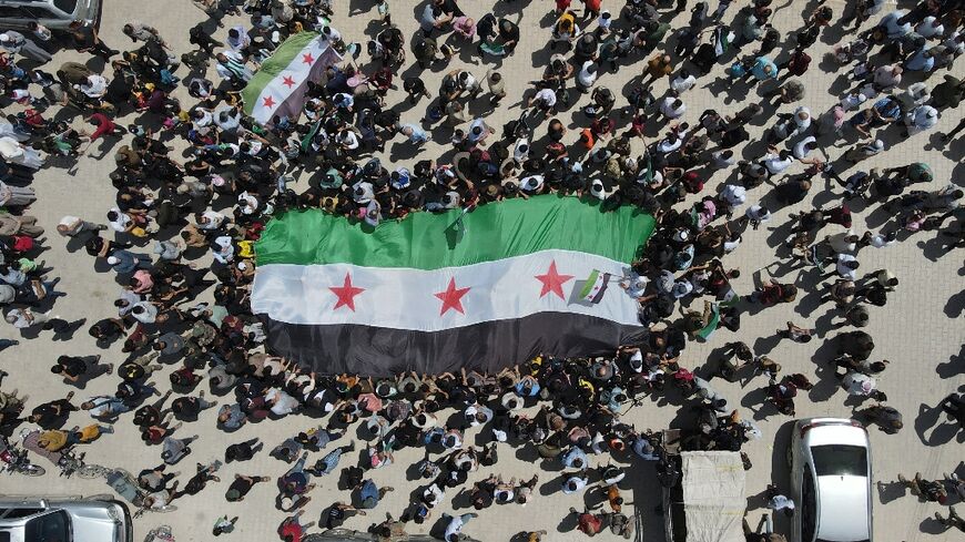 Syrians angry at Assad's rehabiliation protest in the rebel-held city of Afrin