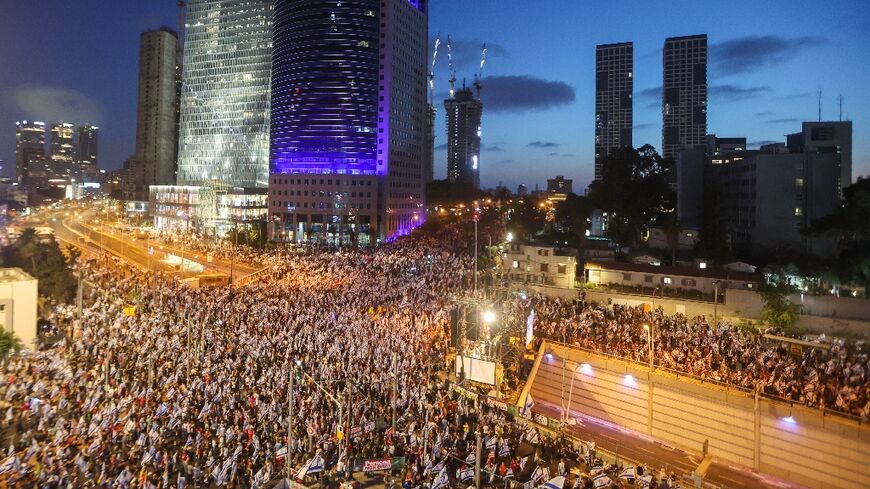 Demonstrators against the government's judicial overhaul bill throng Tel Aviv for the 22nd week running