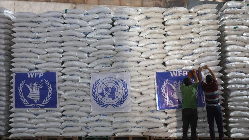 UN food aid stacked in a warehouse near the Bab al-Hawa border crossing