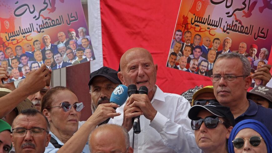 The leader of Tunisia's opposition National Salvation Front, Ahmed Nejib Chebbi, addresses a rally marking the second anniversary of President Kais Saied's dramatic power grab