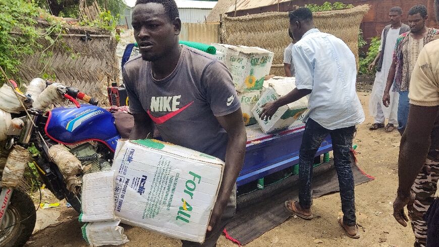 Unloading Ethiopian products in Gallabat on Sudan's border with Ethiopia