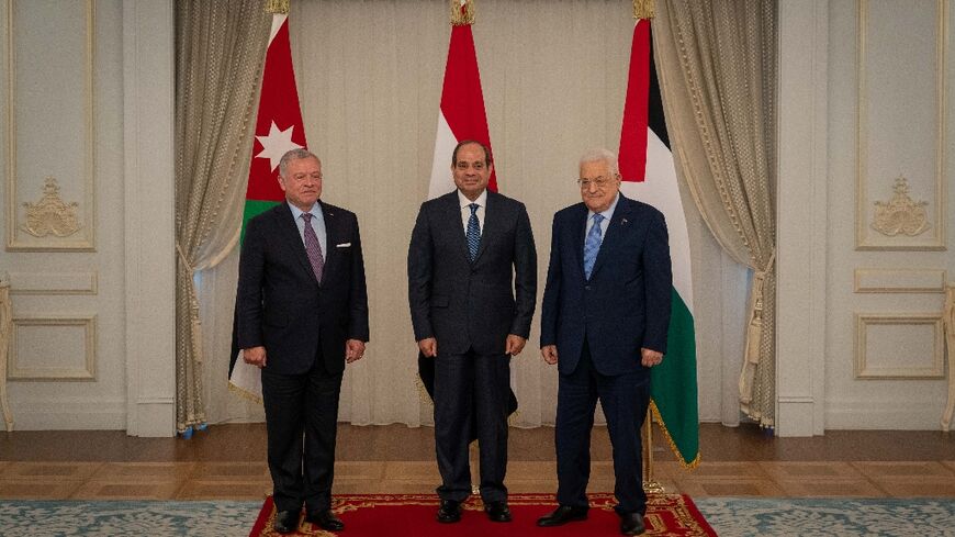 Egyptian President Abdel Fattah al-Sisi and his Palestinian counterpart Mahmud Abbas and Jordan's King Abdullah II during a trilateral summit in El Alamein on Egypt's northern coast