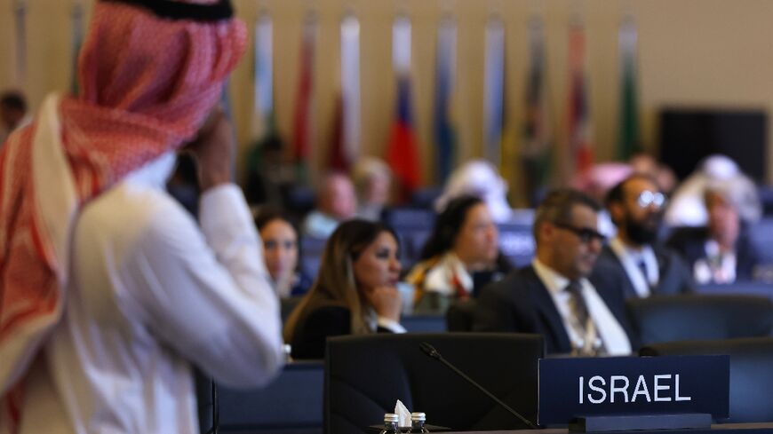 An 'Israel' sign reserves the seats of the Israeli delegation at the UNESCO  World Heritage Committee meeting