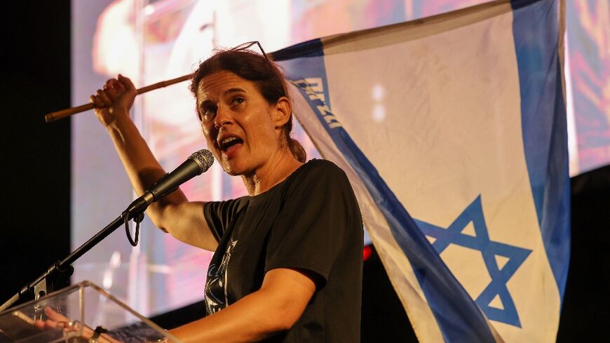 Israeli activist Shikma Bressler delivers a speech during a protest against the Israeli government's judicial overhaul bill, in Tel Aviv on September 9, 2023