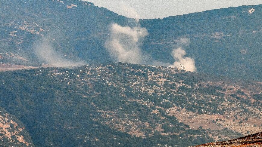 Smoke rises over the contested Shebaa Farms district of Lebanon's border with Israel and the annexed Golan Heights as Iran-backed militant group Hezbollah trades artillery fire with the Israeli army