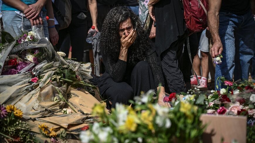 Mourners attend the funeral of a man killed in Hamas' attack on Kibbutz Beeri