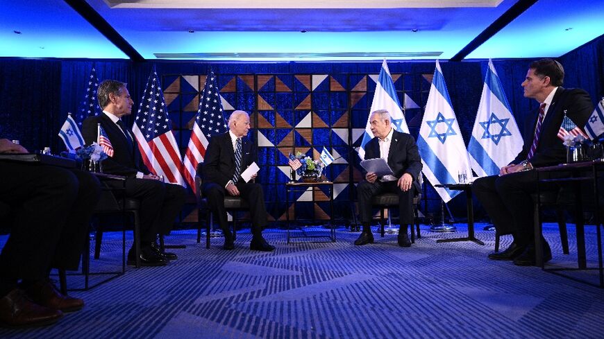 US Secretary of State Antony Blinken listens on as US President Joe Biden and Israel's Prime Minister Benjamin Netanyahu wait to make statements before a meeting in Tel Aviv