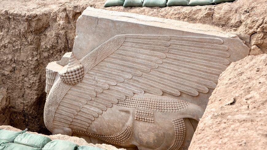 This 2,700 year old relief uncovered by archaeologists in northern Iraq depicts a lamassu, an Assyrian deity portrayed with a human head, the body of a bull and the wings of a bird