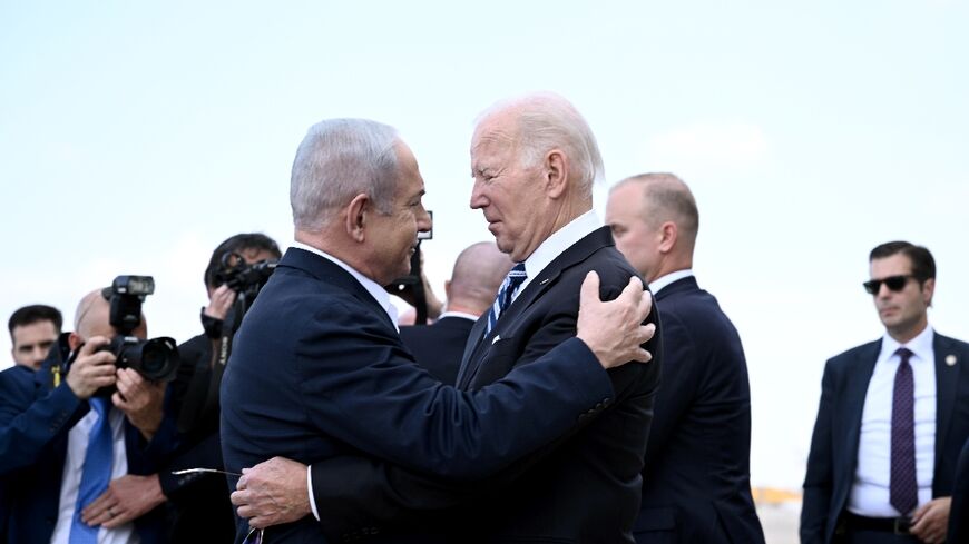 Israel Prime Minister Benjamin Netanyahu greets US President Joe Biden upon his arrival at Tel Aviv's Ben Gurion airport