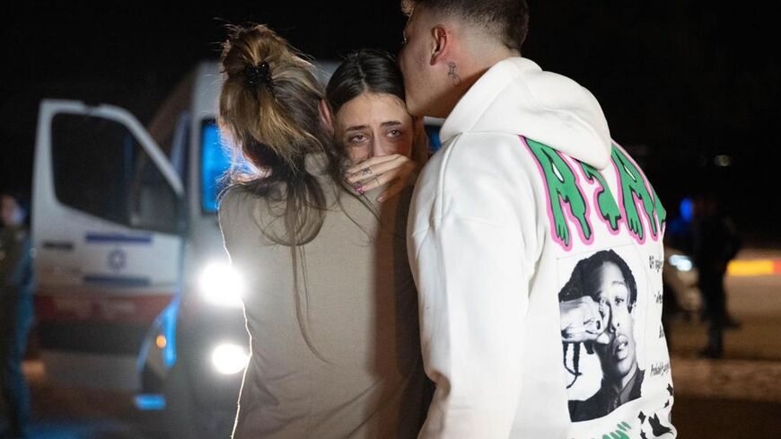 Former Franco-Israeli hostage Mia Shem greets her mother and brother following her release by Hamas