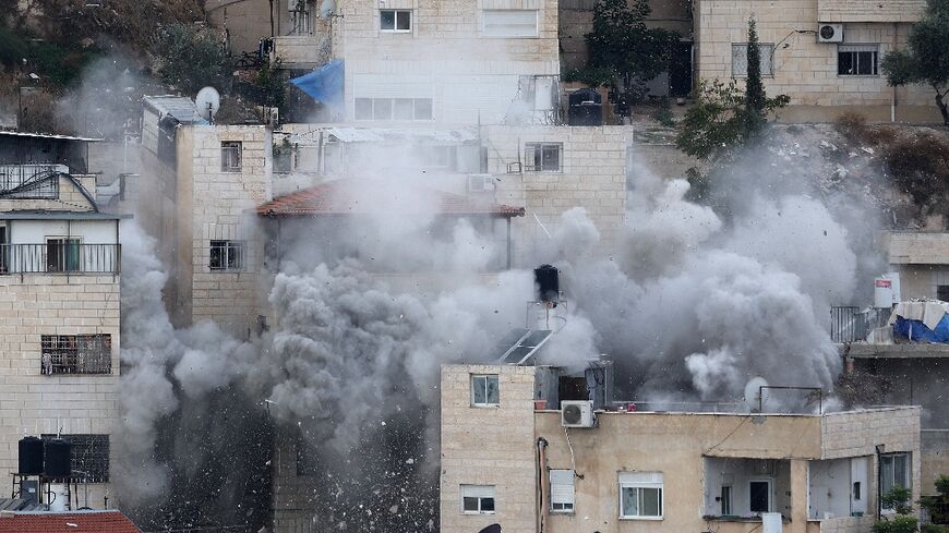 Israeli police demolish the family home of slain Palestinian shooter Khayri Alqam, who killed seven Israelis and a Ukrainian in an attack near a synagogue in annexed east Jerusalem on January 27