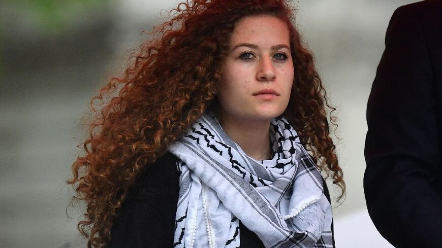A file picture showing Palestinian activist Ahed Tamimi at a rally in London on May 11, 2019
 

 
 
 The Israeli army said on November 6, 2023, it had arrested the prominent 22-year-old Palestinian activist Ahed Tamimi during a raid in the occupied West Bank. "Ahed Tamimi was arrested on suspicion of inciting violence and terrorist activities in the town of Nabi Salih" near Ramallah, an army spokesman told AFP. "Tamimi was transferred to Israeli security forces for further questioning."
