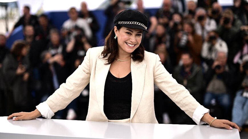 Tunisian actress Hend Sabri poses for photos at the 2023 Cannes Film Festival