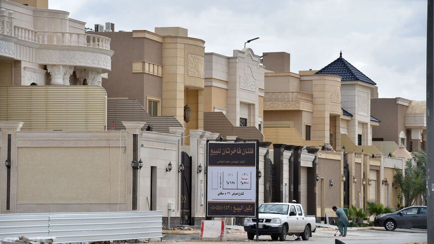Foreign labourers work on the construction of new luxury houses in the Saudi capital Riyadh on April 13, 2019. - Housing is a potential lightning rod for public discontent in a country where affordable dwellings are beyond the reach of many, posing a key challenge for Crown Prince Mohammed bin Salman as he seeks to overhaul the oil-reliant economy. (Photo by FAYEZ NURELDINE / AFP) (Photo credit should read FAYEZ NURELDINE/AFP via Getty Images)