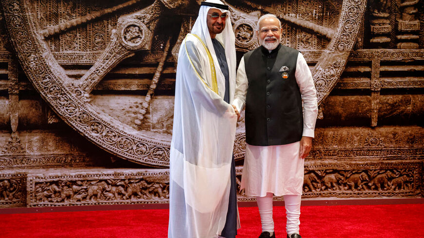 India's Prime Minister Narendra Modi (R) shakes hand with United Arab Emirates President Sheikh Mohamed bin Zayed Al-Nahyan ahead of the G20 Leaders' Summit at the Bharat Mandapam in New Delhi on September 9, 2023. (Photo by Ludovic MARIN / POOL / AFP) (Photo by LUDOVIC MARIN/POOL/AFP via Getty Images)