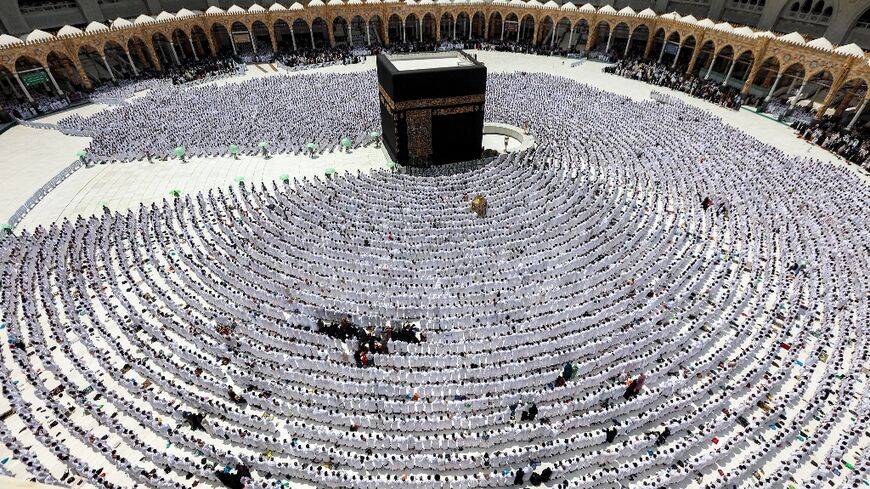 Worshippers at the Kaaba, Islam's holiest shrine, at the Grand Mosque in Mecca on the last Friday of Ramadan