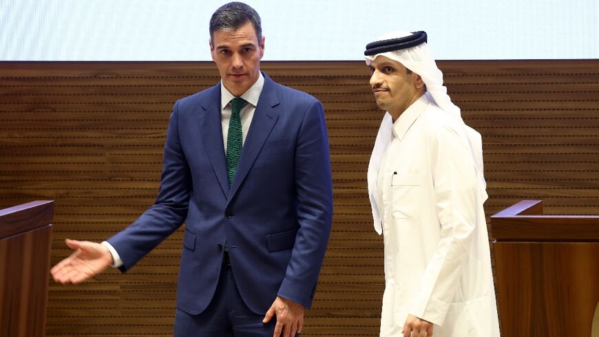 Spanish Prime Minister Pedro Sanchez and his Qatari counterpart Sheikh Mohammed bin Abdulrahman bin Jassim al-Thani give a joint press conference in Doha