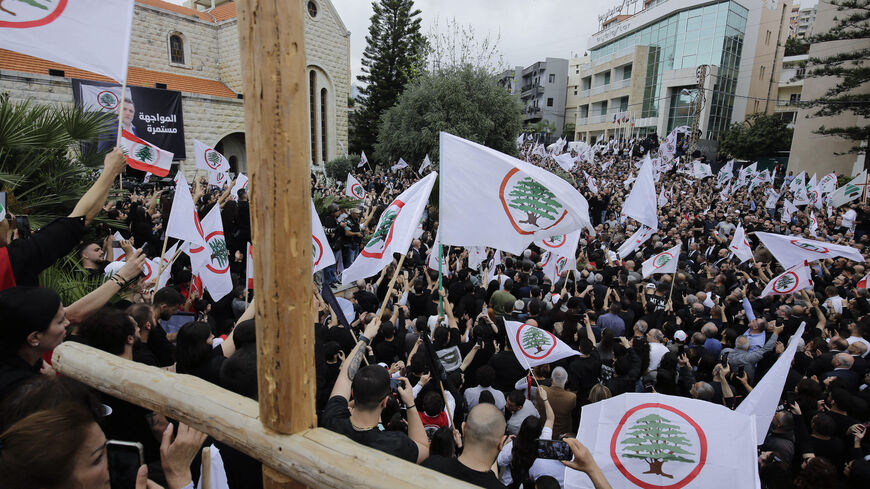 Supporters of the Lebanese Forces (LF) attend the funeral of Pascal Sleiman, a coordinator in the Byblos (Jbeil) area north of Beirut for the LF, in the northern city of Byblos on April 12, 2024. Sleiman was killed on April 8 in what the Lebanese army said was a carjacking by Syrian gang members, who took his body to Syria. (Photo by Ibrahim CHALHOUB / AFP) (Photo by IBRAHIM CHALHOUB/AFP via Getty Images)