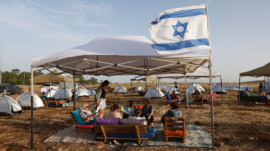 Israeli activists have set up a protest camp near the Lebanese border to demand action to restore security so that the border area's 60,000 evacuees can return to their homes