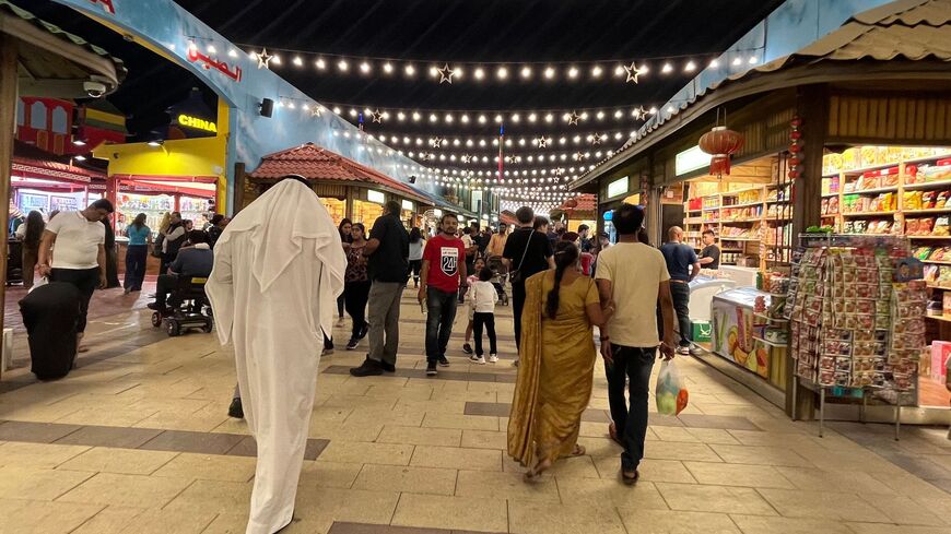 People visit the Global Village, a shopping, dining and entertainment complex in Dubai, on the eve of Eid al-Fitr which ends the Muslim fasting month of Ramadan, on April 20, 2023. (Photo by Giuseppe CACACE / AFP) (Photo by GIUSEPPE CACACE/AFP via Getty Images)