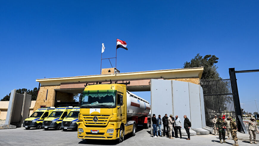 An Egyptian tanker truck bearing the insignia of the United Nations enters the Egyptian side of the Rafah border crossing with the Gaza Strip on March 23, 2024, amid the ongoing conflict in the Palestinian territory between Israel and the Palestinian militant group Hamas. (Photo by Khaled DESOUKI / AFP) (Photo by KHALED DESOUKI/AFP via Getty Images)