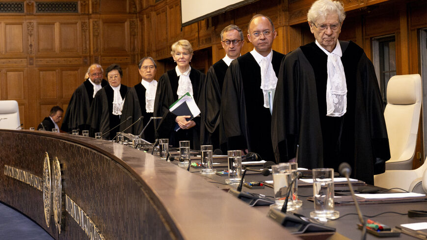 Court's president Joan Donoghue (C) and associate judges arrive to hear South African arguments to the International Court of Justice (ICJ) as part of South Africa case against Israel over Rafah offensive in The Hague, on May 16, 2024. 