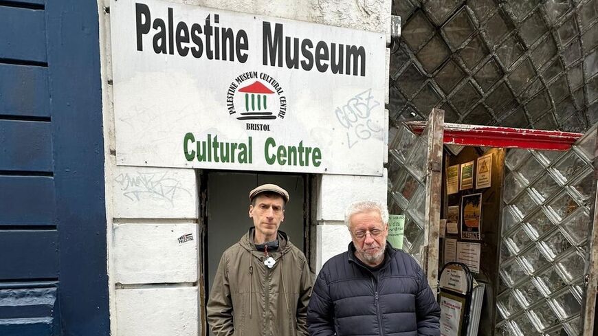 Ron Mendel and Peace, volunteers at the Palestine Museum and Cultural Centre in Bristol, southwest England, stand outside the museum in April 2024.