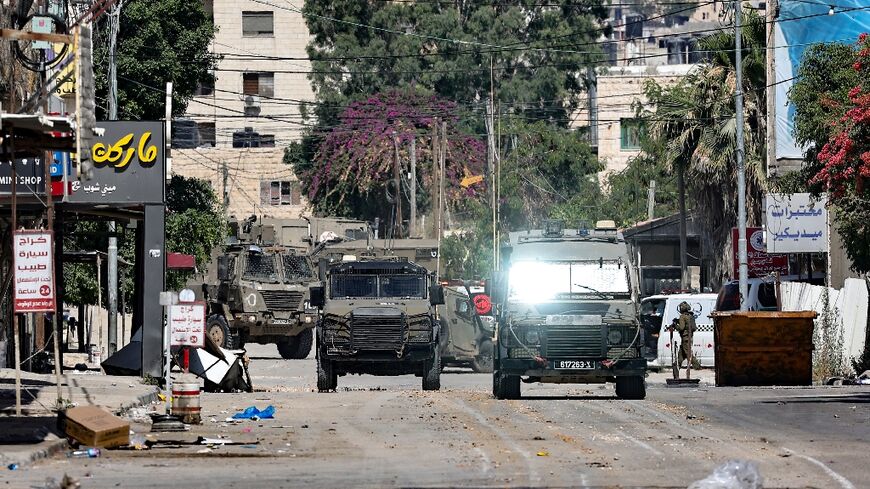 Israeli army vehicles at the entrance to Jenin in the occupied West Bank during the raid