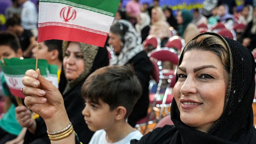An Alireza Zakani supporter at a rally for the candidate in Tehran