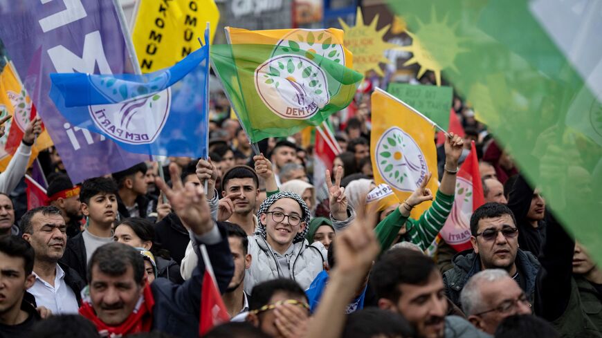 Supporters of the pro-Kurdish Peoples DEM Party attend a rally for the Turkish Municipal elections to be held on March 31, in Esenyurt Square, in Istanbul on February 25, 2024. (Photo by YASIN AKGUL / AFP) (Photo by YASIN AKGUL/AFP via Getty Images)