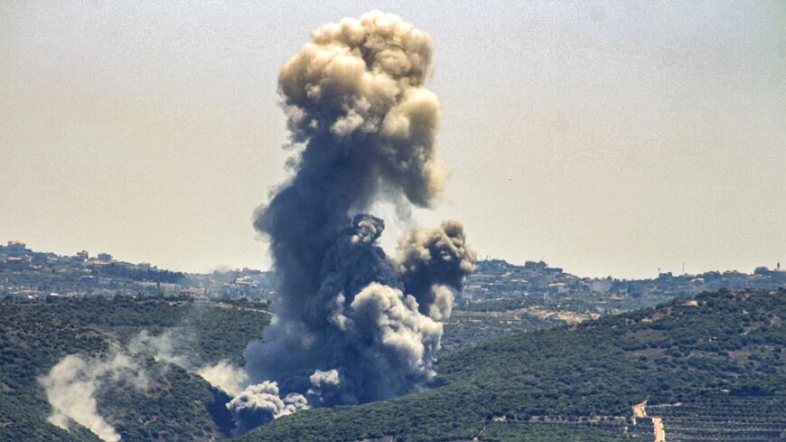 Smoke billows from the site of an Israeli airstrike on Zibqin in southern Lebanon on June 12, 2024.