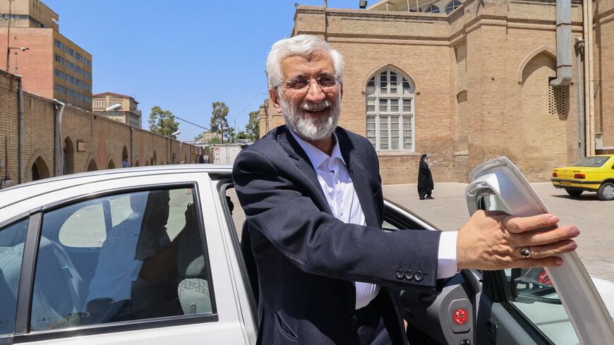 Iranian presidential candidate Saeed Jalili arrives to attend an election campaign rally in Tehran on June 18, 2024.