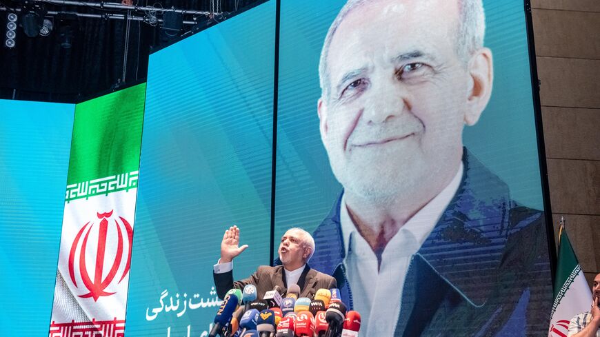 Former foreign minister of Iran, Mohammad Javad Zarif, delivers a speech during an electoral campaign rally to support Masoud Pezeshkianin in Tehran, Iran, on June 19, 2024. Iran is holding snap presidential elections to choose the next president after the death of Ebrahim Raisi in a helicopter crash. (Photo by Hossein Beris / Middle East Images / Middle East Images via AFP) (Photo by HOSSEIN BERIS/Middle East Images/AFP via Getty Images)