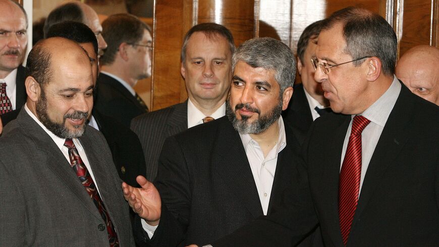 Radical Palestinian group, Hamas chief, Khaled Meshaal (2nd R) introduces his deputy Moussa Abu Marzouk (L) to Russian Foreign Minister Sergey Lavrov.