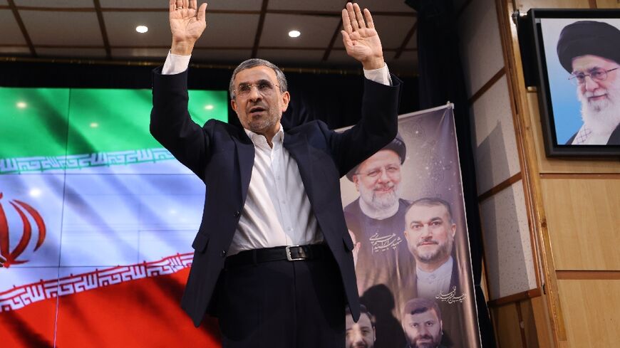 Former Iranian president Mahmoud Ahmadinejad waves to the crowd after registering his candidacy for Iran's upcoming presidential election in Tehran on June 2, 2024