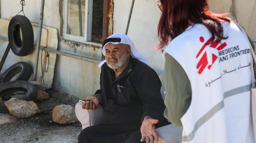 'This land is ours,' says Mohamed al-Nawajaa, 78, talking with a Doctors Without Borders coordinator in Susya village, in the Israeli-occupied West Bank