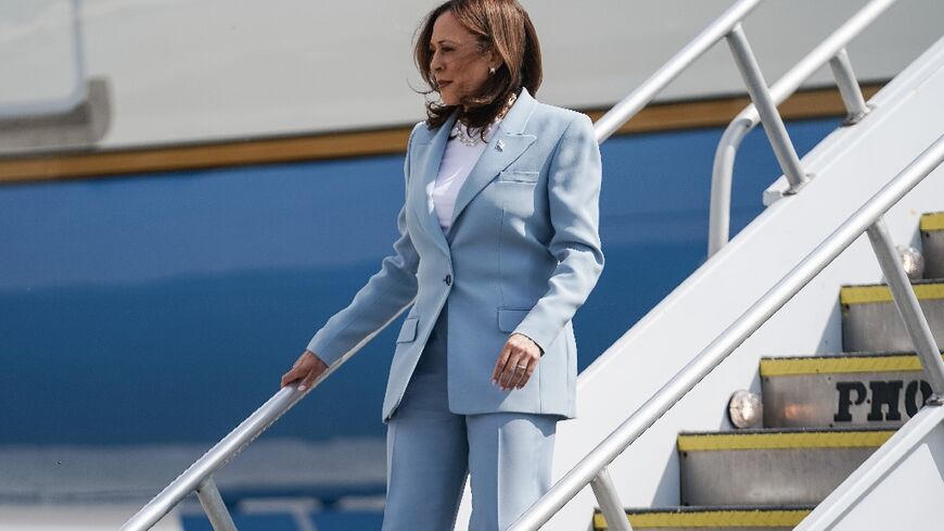 US Vice President and 2024 Democratic presidential candidate Kamala Harris steps off Air Force Two as she arrives at Hartsfield Jackson International Airport in Atlanta, Georgia, on July 30, 2024, to attend a campaign event.