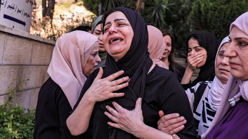 The mother of Ahmad Ramzi Sultan mourns her son