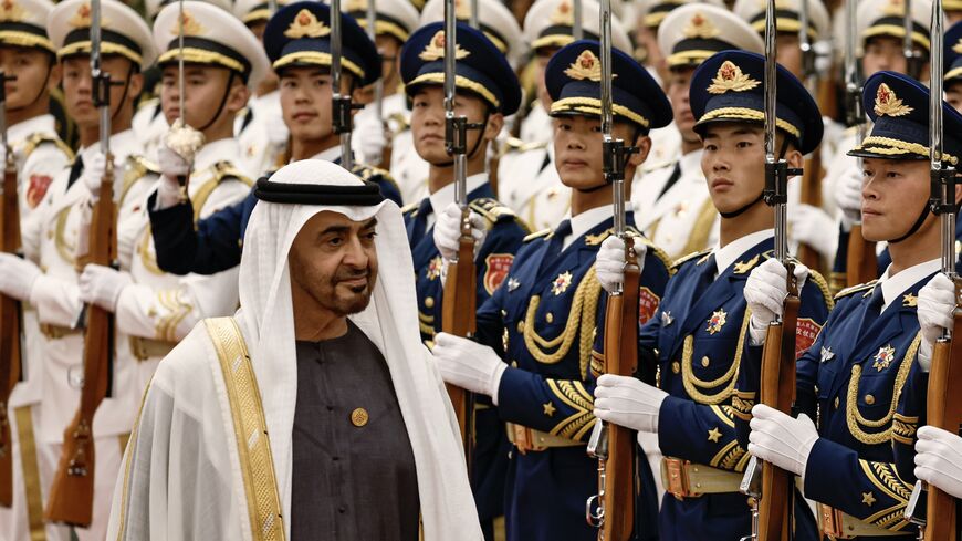 United Arab Emirates President Sheikh Mohammed bin Zayed Al Nahyan reviews the honour guard.