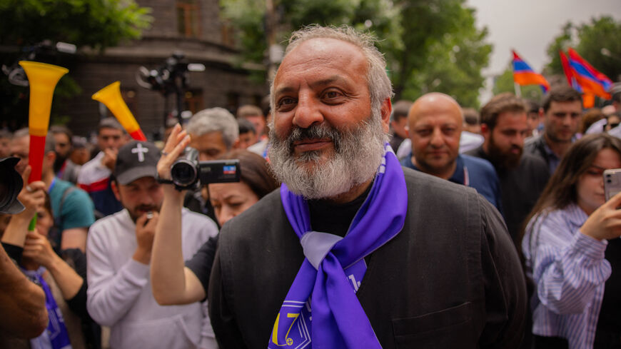 The protest movement leader Archbishop Bagrat Galstanyan participates during the rally demanding the Armenian Prime Minister Nikol Pashinyan's resignation over land transfer to neighboring Azerbaijan, outside the government building in central Yerevan on May 30, 2024. 