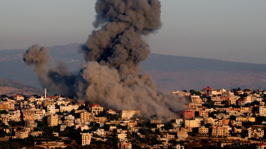 Black smoke billows following an Israeli air strike that targeted a house in the southern Lebanese village of Khiam near the Lebanese-Israeli border on June 21, 2024.