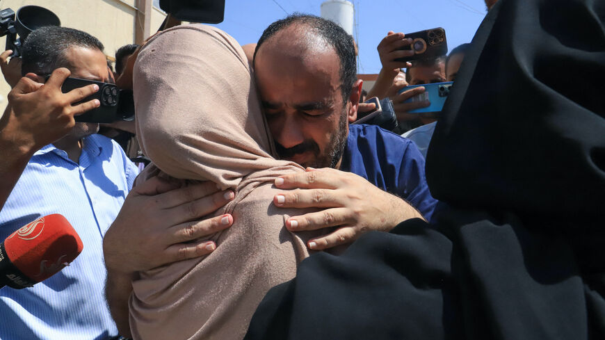 Al-Shifa hospital director Mohammed Abu Salmiya who was detained by Israeli forces since November, is welcomed by relatives after his release alongside other detainees, at Nasser hopsital in Khan Yunis in the southern Gaza Strip July 1, 2024, amid the ongoing conflict between Israel and the Palestinian Hamas militant group. 