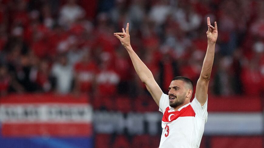 Turkey's defender Merih Demiral makes a controversial hand gesture as he celebrates scoring his team's second goal during the UEFA Euro 2024 round of 16 football match between Austria and Turkey at Leipzig Stadium, Leipzig, Germany, July 2, 2024.